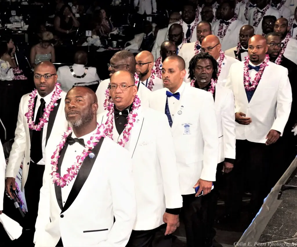 Gents parading for the Phi Beta Sigma International Grand Orchid Ball.
