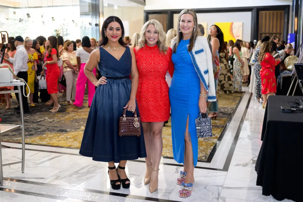 Raffle chairs Elia Gabbanelli, Kristen Collins, Bethany Buchanan at the PaperCity Philanthropy in Fashion Best Dressed luncheon (Photo by Michelle Watson)