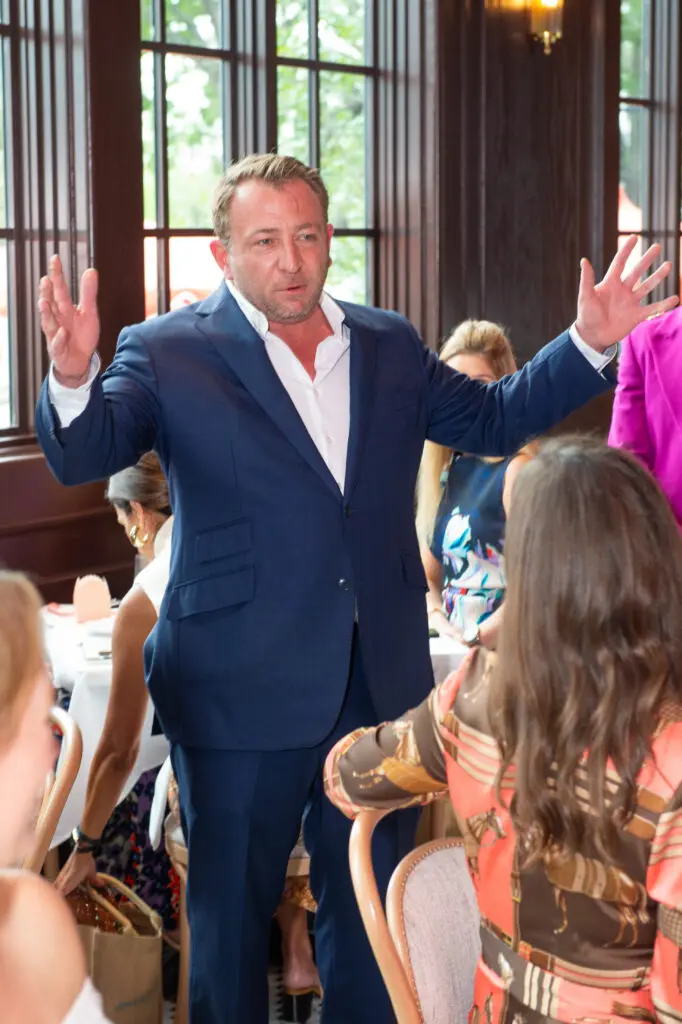 Host Ben Berg welcomes 65 ladies to the Annabelle Brasserie first look luncheon in Autry Park (Photo by Jacob Power)