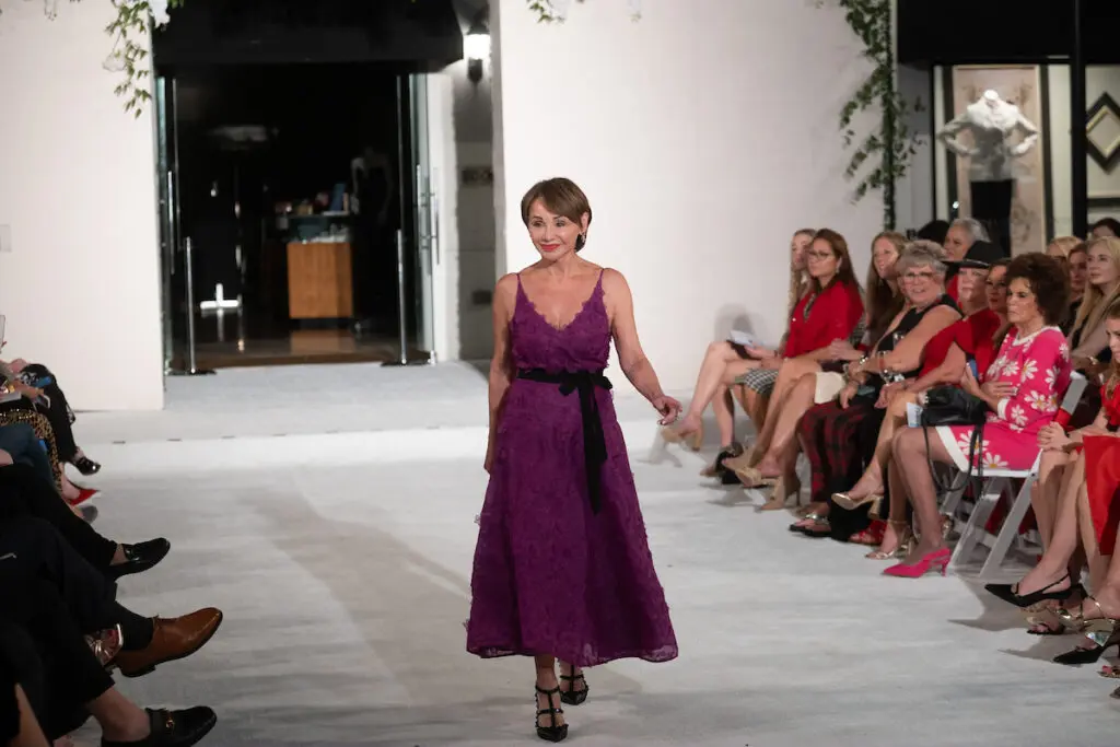 Gaye Lynn Zarrow on the runway at the Elizabeth Anthony Go Red for Women fashion event. (Photo by Daniel Ortiz)