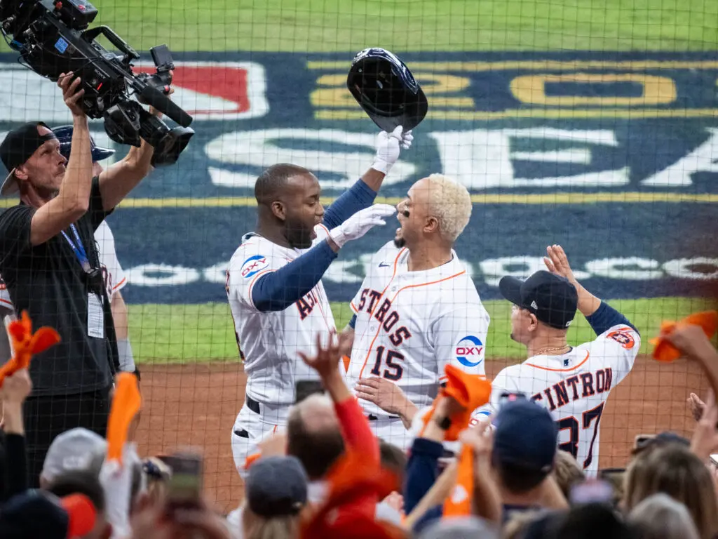 Yordan Alvarez and catcher Martin Maldonado know there is no party like an Astros playoff party. (Photo by F. Carter Smith)