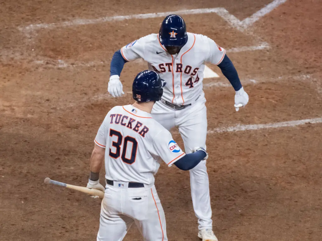 Yordan Alvarez and Kyle Tucker know how to celebrate big playoff moments. (Photo by F. Carter Smith)