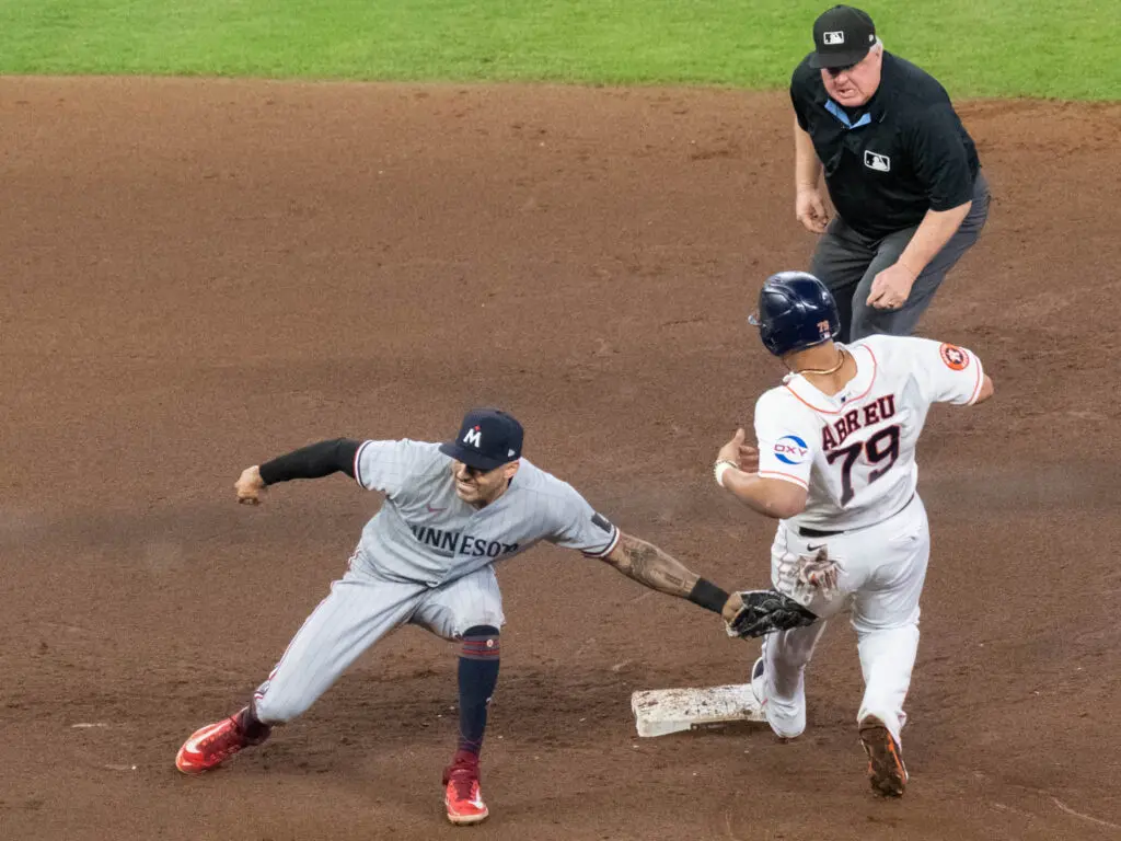 Carlos Correa deked out Astros first baseman Jose Abreu on this tag. (Photo by F. Carter Smith)