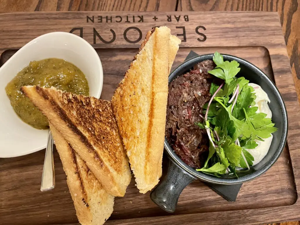 Brisket marmalade with fresh burrata and jalapeno peach jam at the soon to open Second Bar + Kitchen. (Photo by Courtney Dabney)