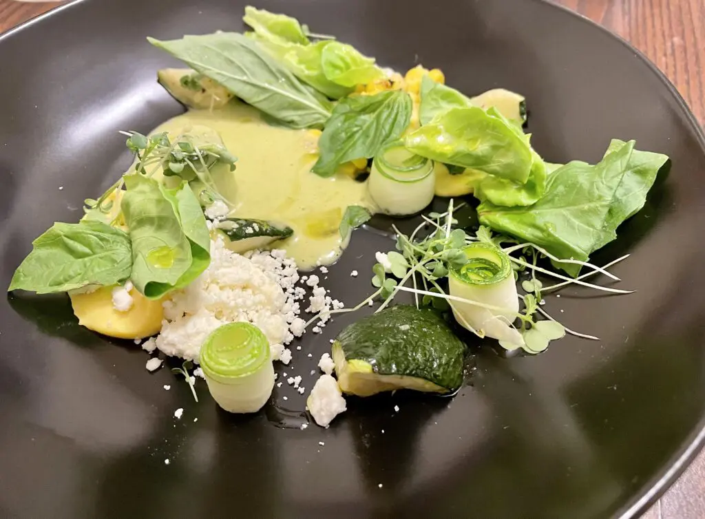 Chef David Bull's farm to market salad with butter lettuce, basil and corn puree. (Photo by Courtney Dabney)