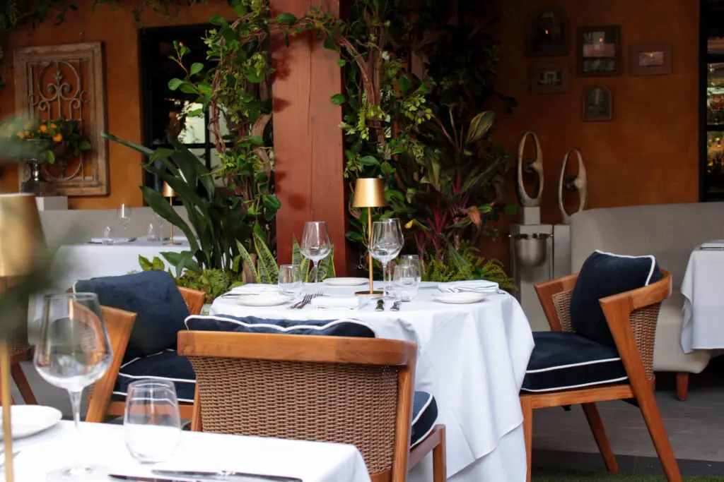 The patio of the new La Griglia is a plush, verdant dining space. (Photo courtesy of Landry's Inc.)