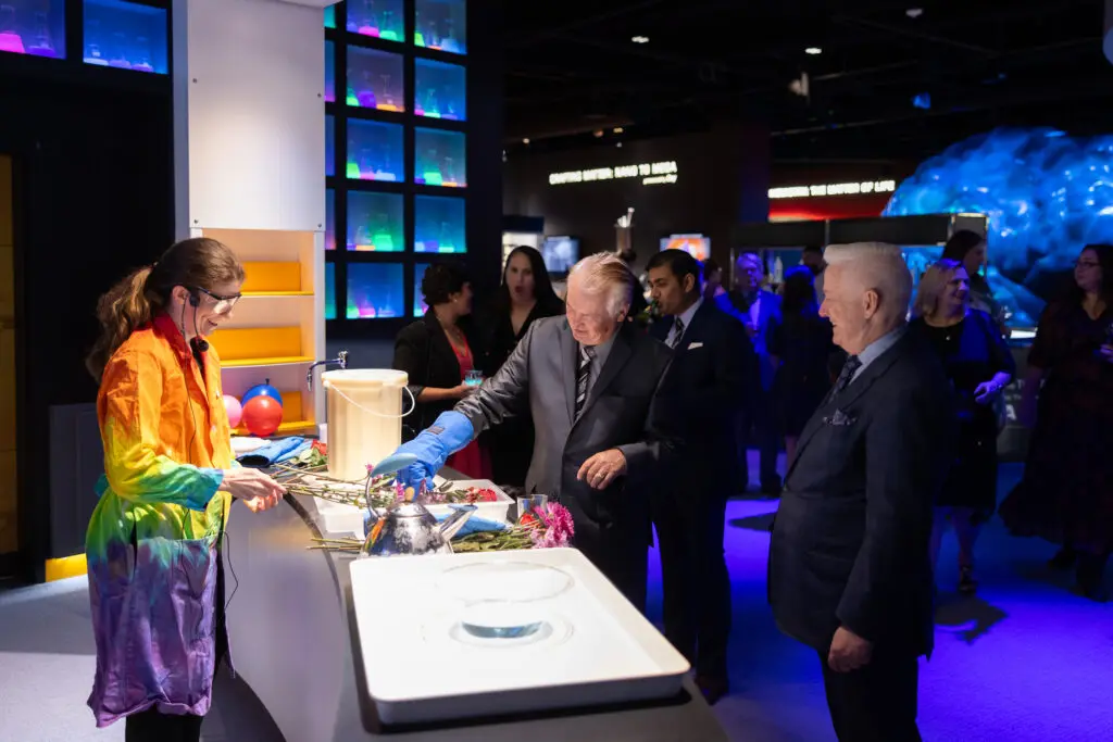 People are intrigued by experiments under way at the HMNS Welch Hall Demonstration Lab presented by Shell USA Inc. (Photo by Mike Rathke, HMNS Photographer)
