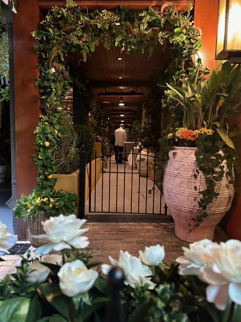 A side exit from the patio at the new La Griglia, 2817 West Dallas, is decked in florals and vine. (Photo by Shelby Hodge)