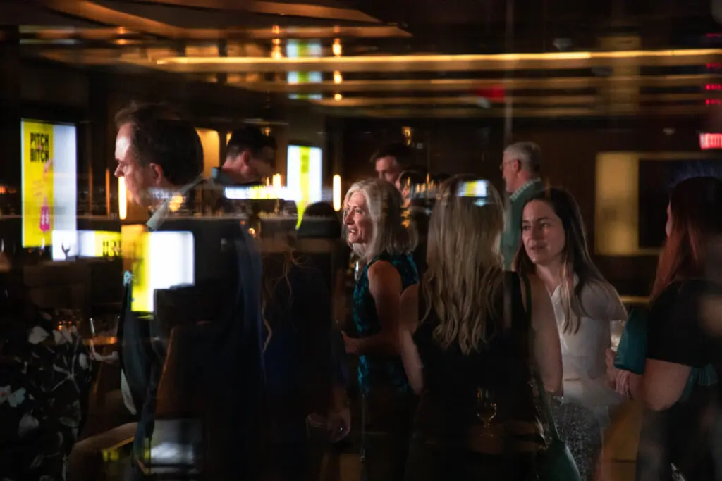 Guests mixed, mingle and talked all things finance. (Photo by All Hallows Productions)