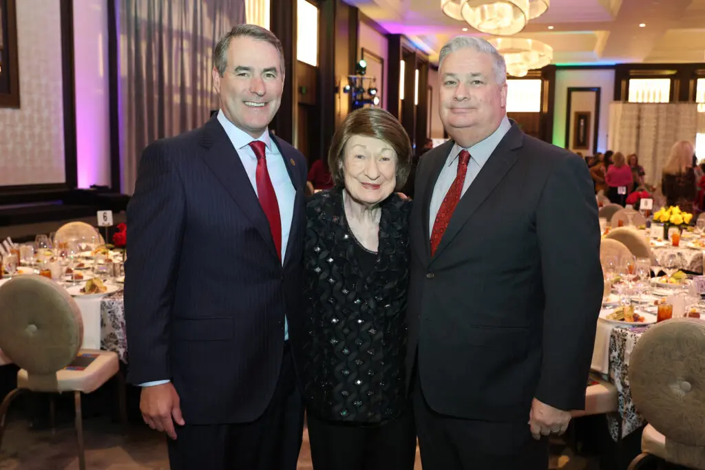 Steve Mach, Lifetime of Substance honoree Cora Sue Mach, Butch Mach at the Women of Substance luncheon.  (Photo by Priscilla Dickson)