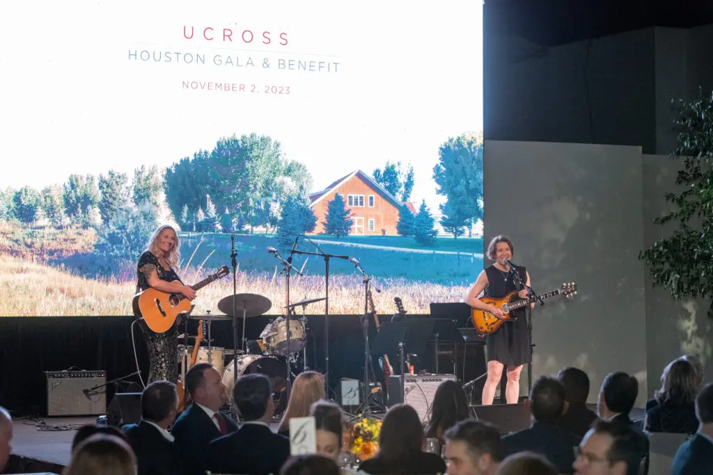 Ucross alumni Sarah Sample and Kate Schutt perform at the 40th anniversary gala of the artist in residency program.   (Photo by Jenny Antill)