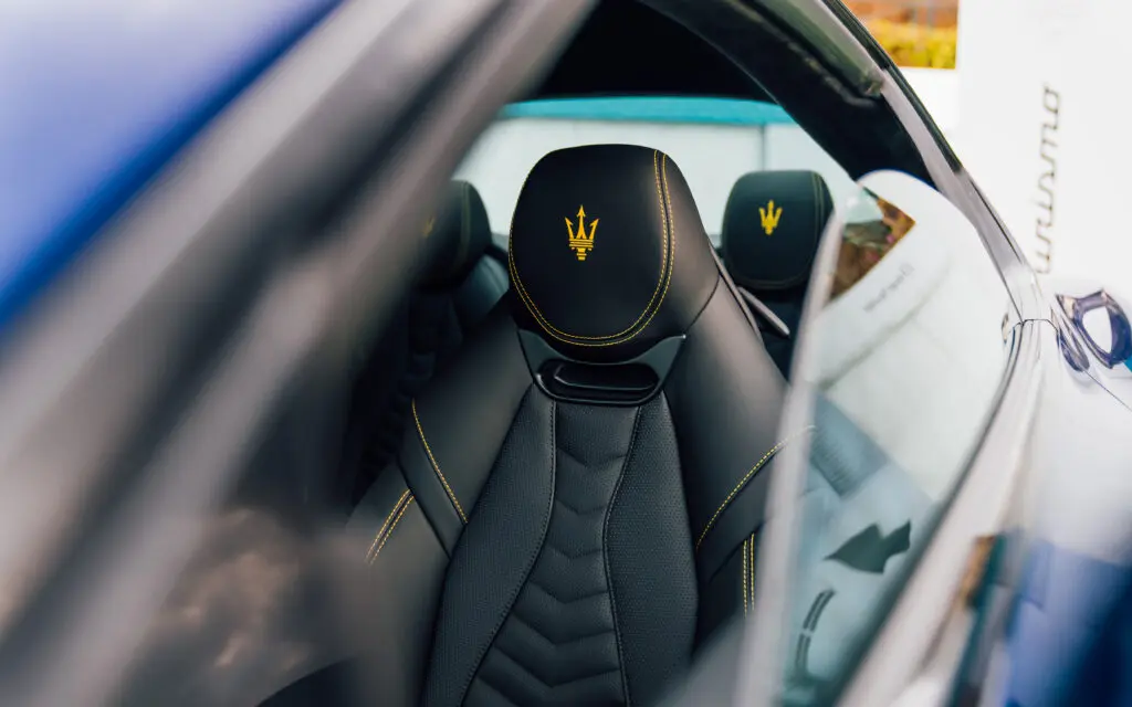 The leather-wrapped surfaces feel great and the seats are properly plush and fabulously bolstered and perfect for hours-long road trips. (Courtesy Maserati)