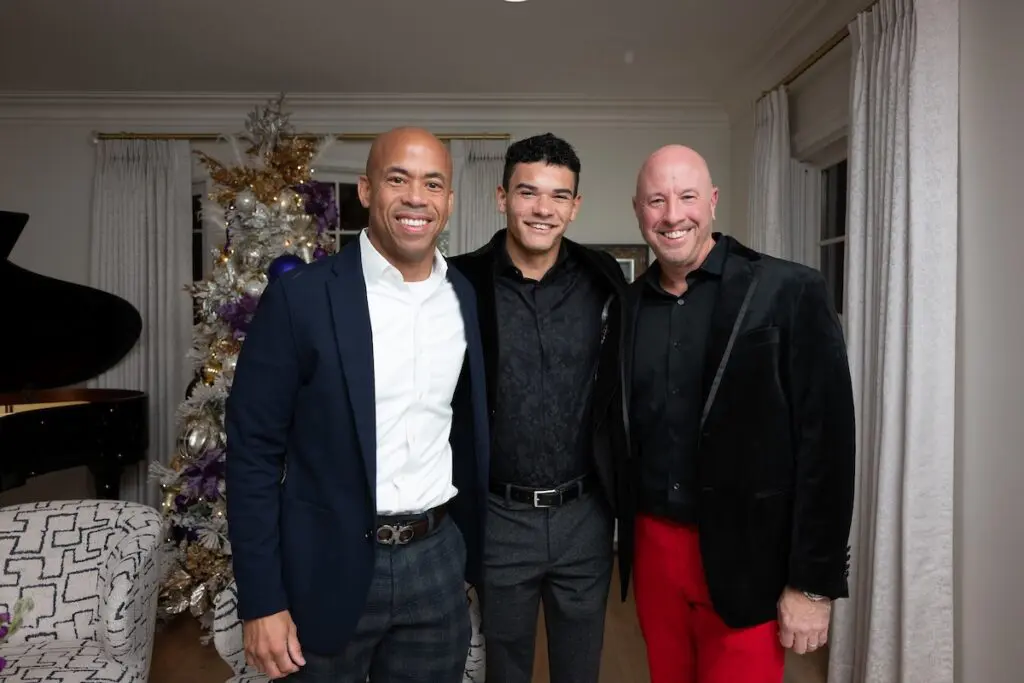 Bobby Hilliard, Colby Hilliard, Greg Fown at the Legacy Community Health 'Holiday Schmooze' (Photo by Daniel Ortiz)