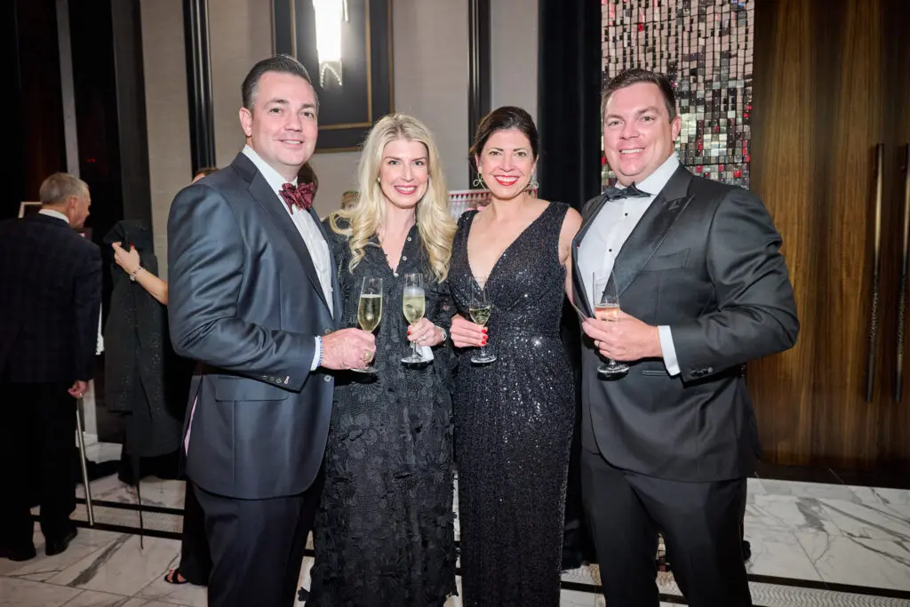 Casey & Stacy Stewart, Lindsay & Jason Weddle at the Spindletop Holiday Ball (Photo by PWL Studios/Fulton Davenport)