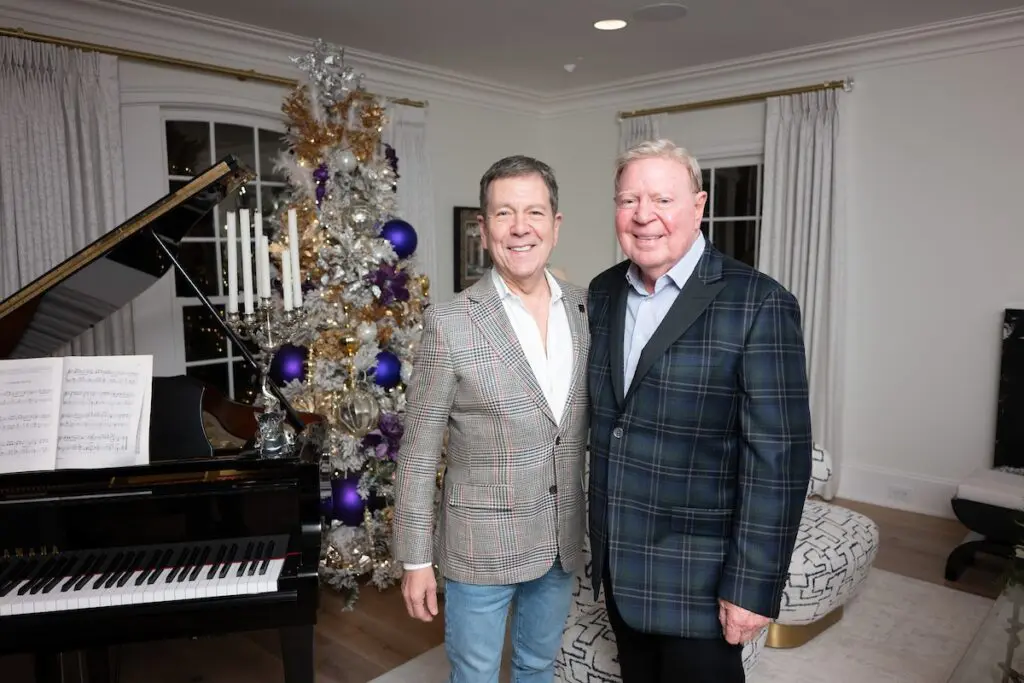 George Hawkins, Jim Hazen at the Legacy Community Health 'Holiday Schmooze' (Photo by Daniel Ortiz)