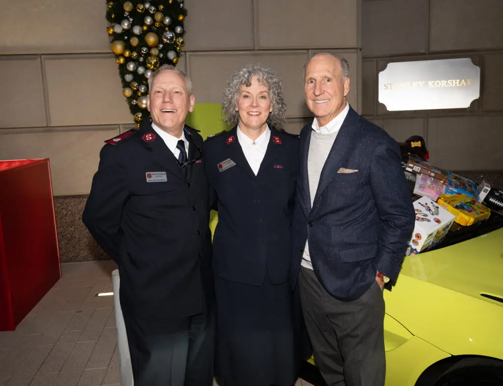 Major Paul McFarland, Major Dawn McFarland, Crawford Brock (Photo by George Fiala)