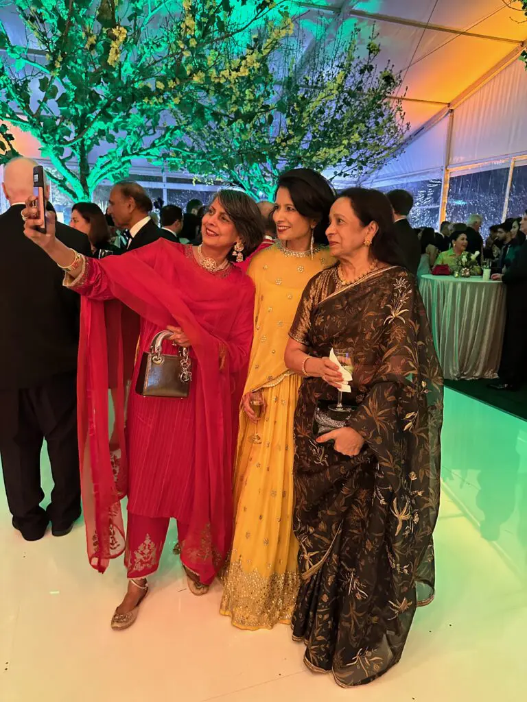 Grabbing a selfie with Renu Khator and Sushila Agrawal at the Asia Society Texas Center Tiger Ball. (Photo by Shelby Hodge)