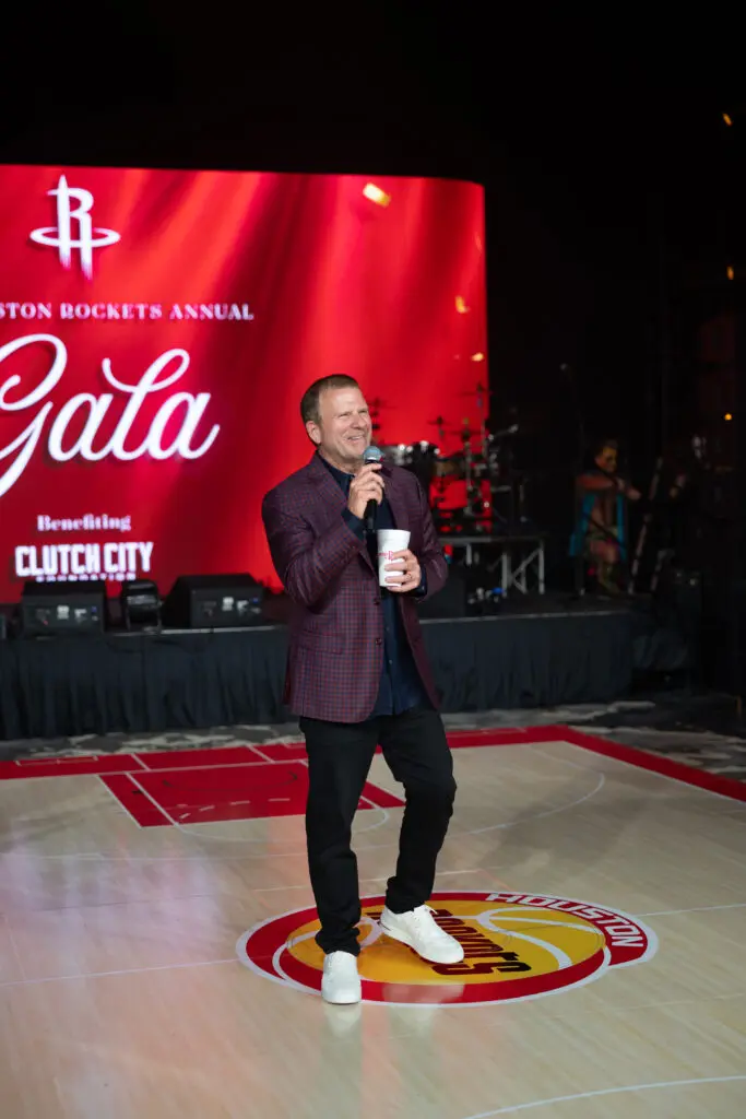 Rockets owner and hospitality magnate Tilman Fertitta addresses guests at the Houston Rockets Clutch City Foundation gala at the Post Oak Hotel.