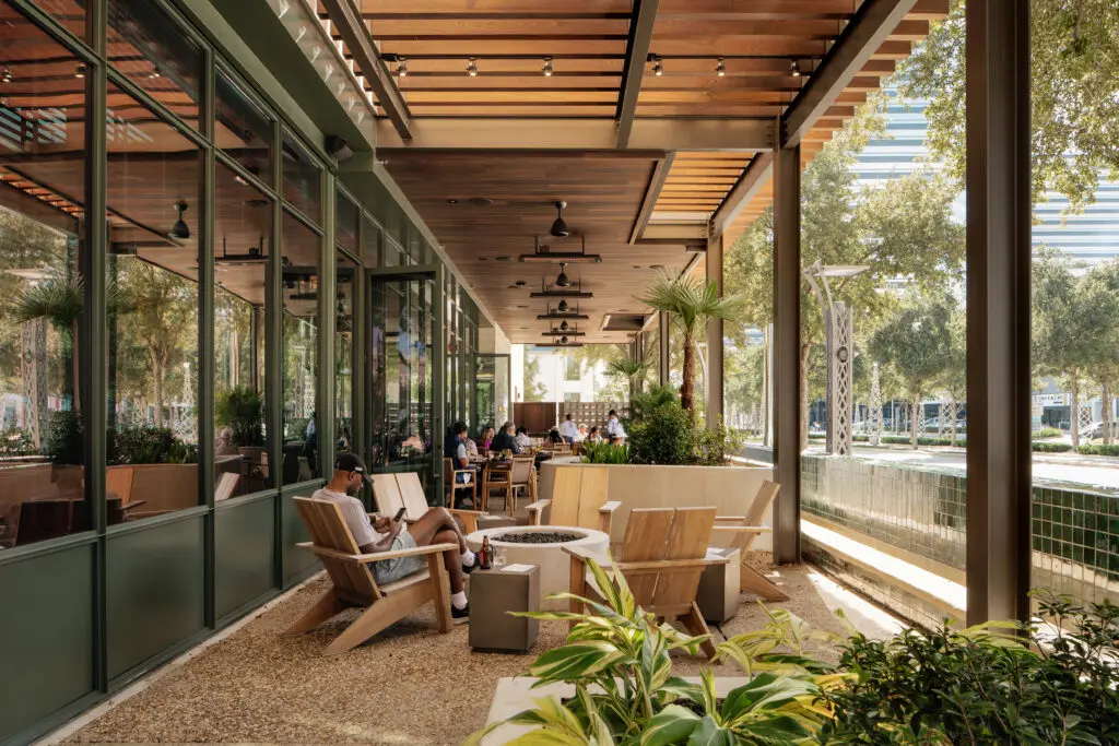 Balboa Surf Club features a large covered patio which runs the length of Post Oak Boulevard.