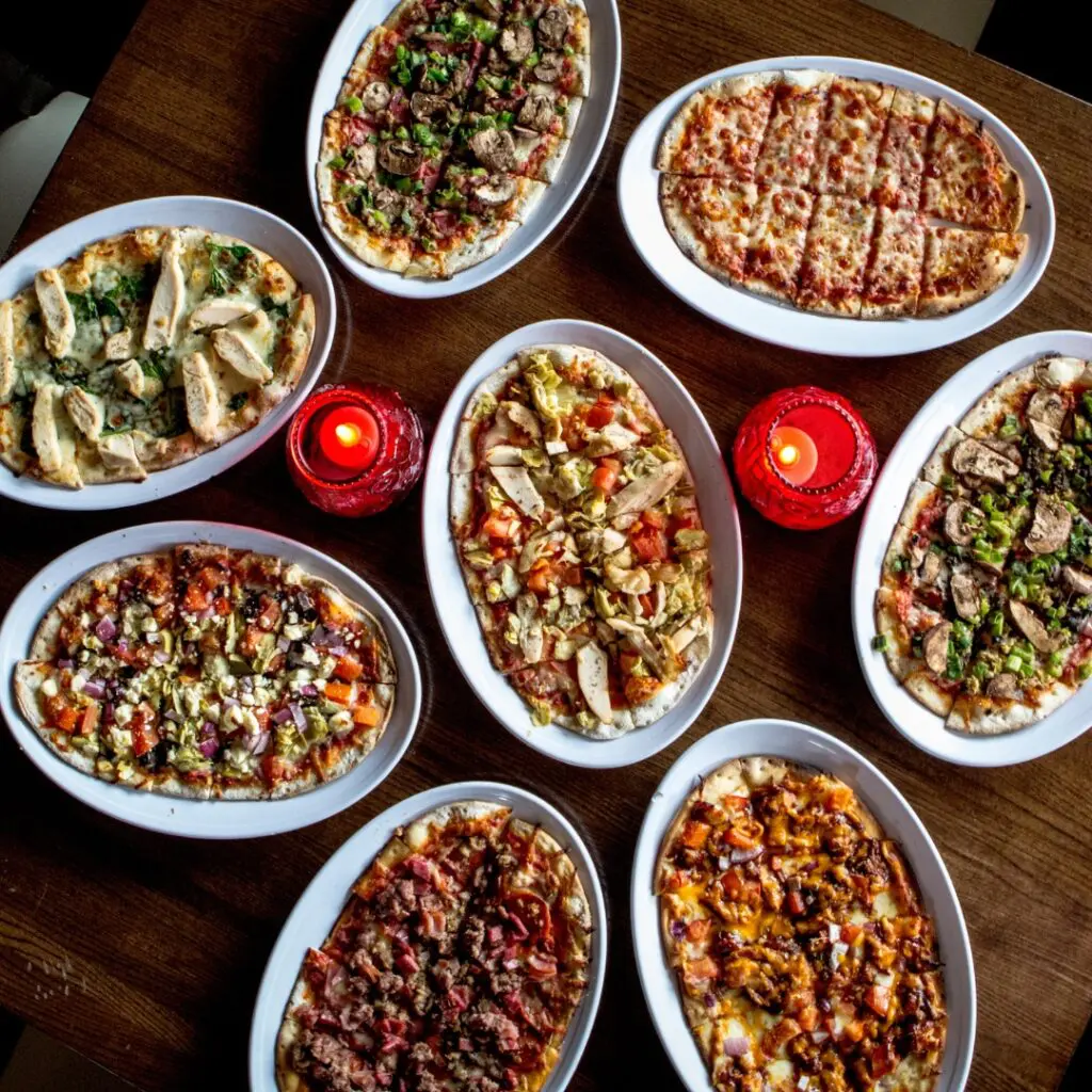 Campisi's is well-known for its crispy, oval pizza with ample toppings.