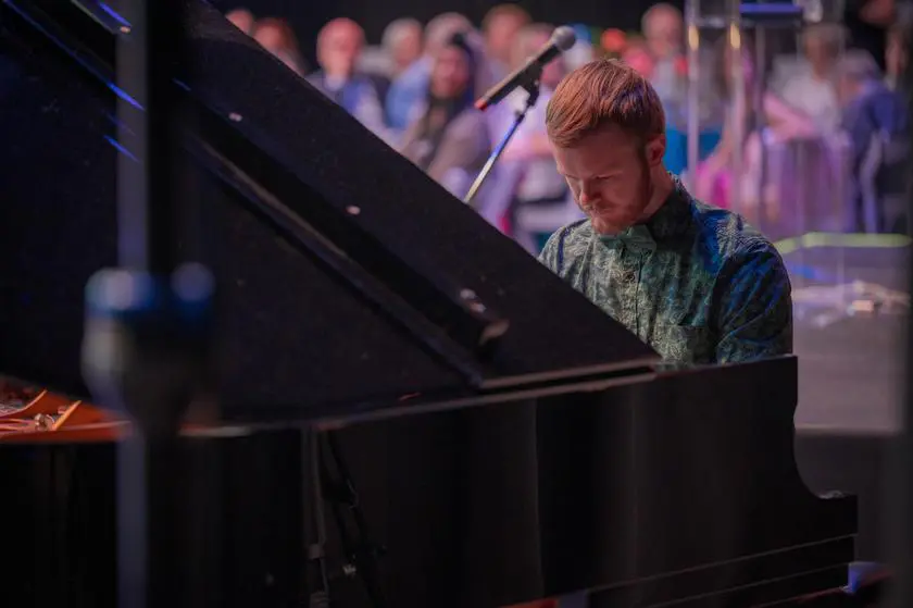 University of Texas-Austin senior Matthew Nell delighted the crowd with two pieces - one an original composition.  Nell is a graduate of Willis High School. (Photo by Scott Shaver)