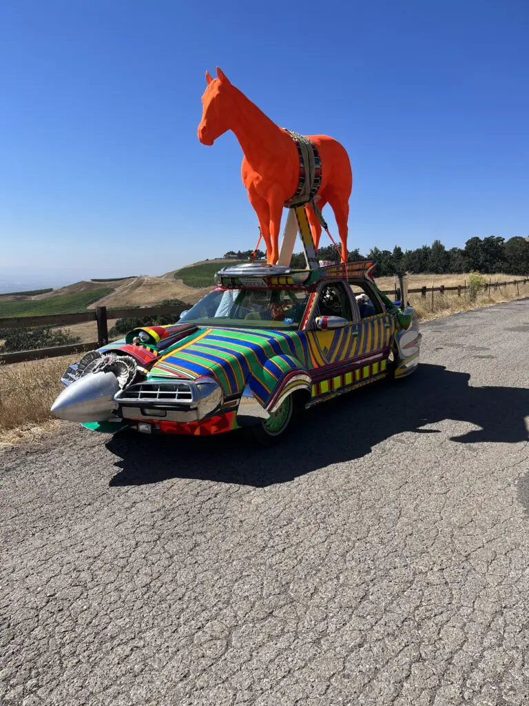 342 David Best’s Orange Horse, 2023, rolls at this spring’s Houston Art Car Parade