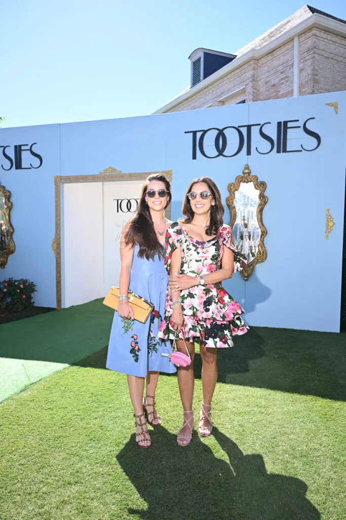 Elizabeth Chen Douglass, Julie Chen at the River Oaks tennis tournament luncheon.