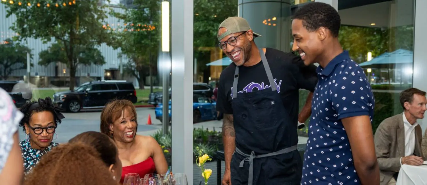 Chef Chris Williams and Dancer Eric Best visiting with guests; Photo by Melissa Taylor