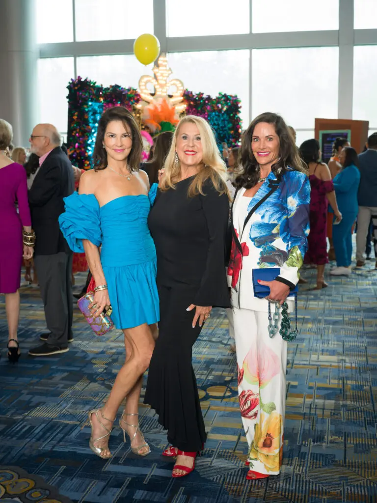 Jessica Rossman, Pam Bellin, Mauney Mafrige at the Latin Women's Initiative fashion show and luncheon. (Photo by Daniel Ortiz)