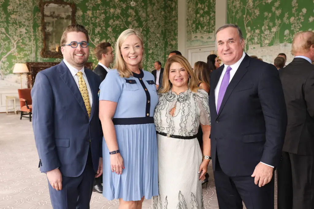 Taylor Kidd, Kim Koehn, Leticia & Steve Trauber at the Men of Distinction luncheon