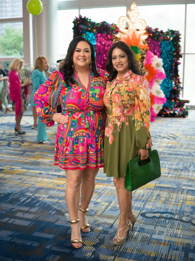 Vicki Luna, Conchita Reyes at the Latin Women's Initiative fashion show and luncheon. (Photo by Daniel Ortiz)