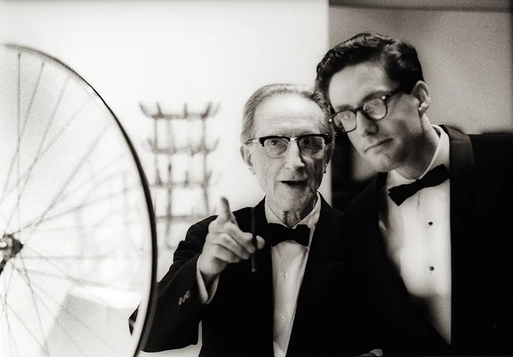 From Left: Marcel Duchamp and Walter Hopps. Artist Terrell James was friends with Hopps and his wife Caroline Huber for many years. (Photo: © 1963 Julian Wasser)