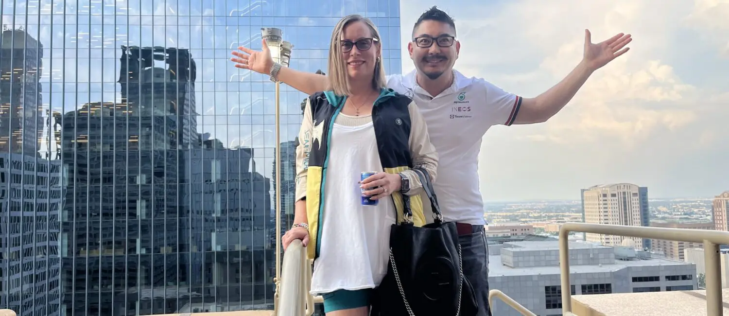 Krishena Anderson & Marcos Ikeda admire the view from a balcony at Kaze Burning Man Esperson Building. (Photo by Jenna Baer).
