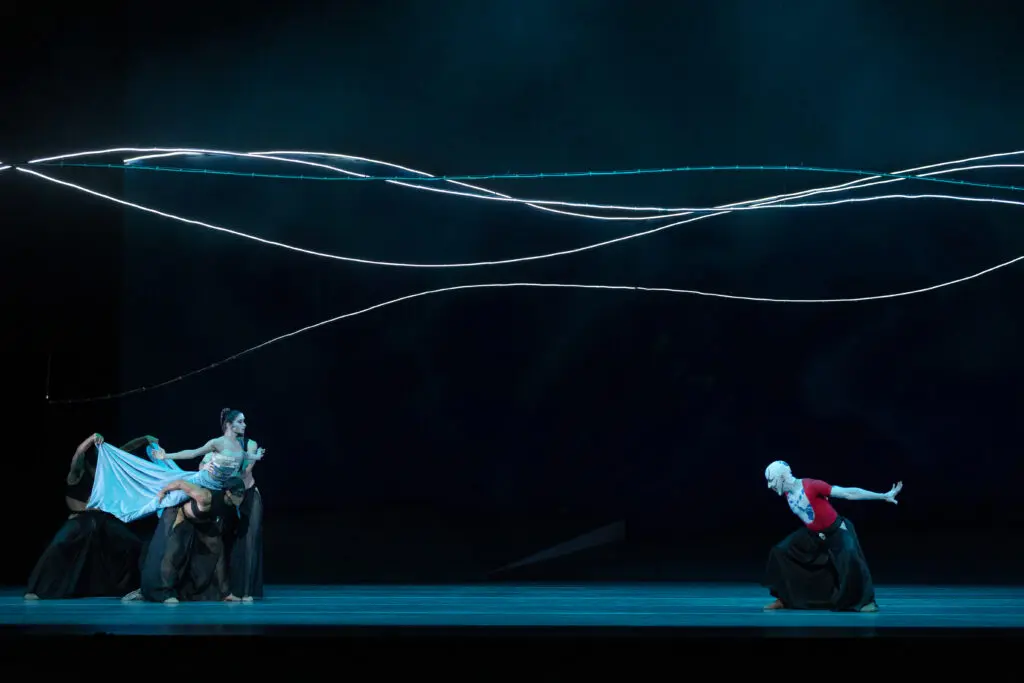 Houston Ballet principal Karina González as The Little Mermaid/His Creation and first soloist Harper Watters as The Sea Witch, with Artists of Houston Ballet in John Neumeier’s "The Little Mermaid." (Photo by Amitava Sarkar)