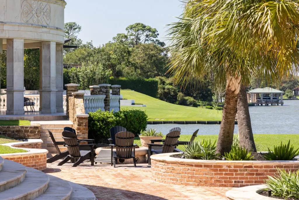 Houston Wonder Mansion Boasts a 12-Car Garage, a 12-Person Shower, Helipad Access and Lakefront Views