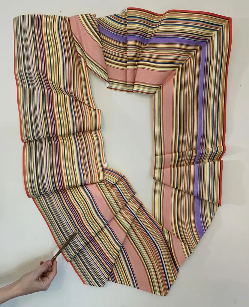 Laura Waldusky artfully crinkled paper for "Wonder Woman," 2023, now showcasing at Avant-Art Gallery.