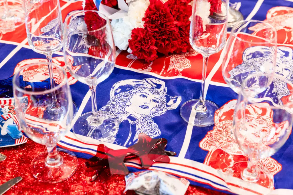 Limited edition event scarf with art by fashion illustrator, Kelsey Linnartz. (Photo by Ellman Photography)
