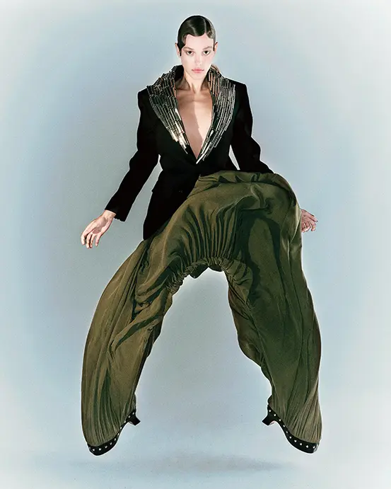 Loewe wool embroidered jacket, and viscose draped shoe trouser, at Loewe Highland Park Village, Neiman Marcus, farfetch.com, net-a-porter.com.  (Photo by Enmi Yang)