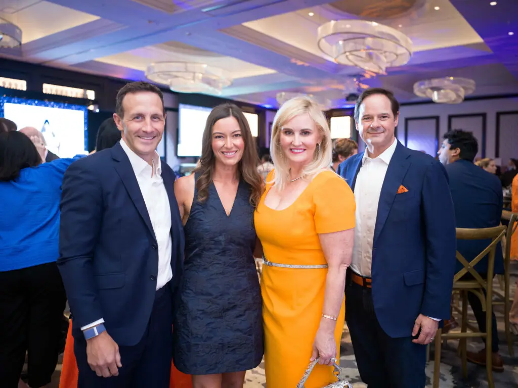 Garrett & Jayne Johnston, Jennifer & Scott Allison at the 'Team Up' fundraiser (Photo by Daniel Ortiz)
