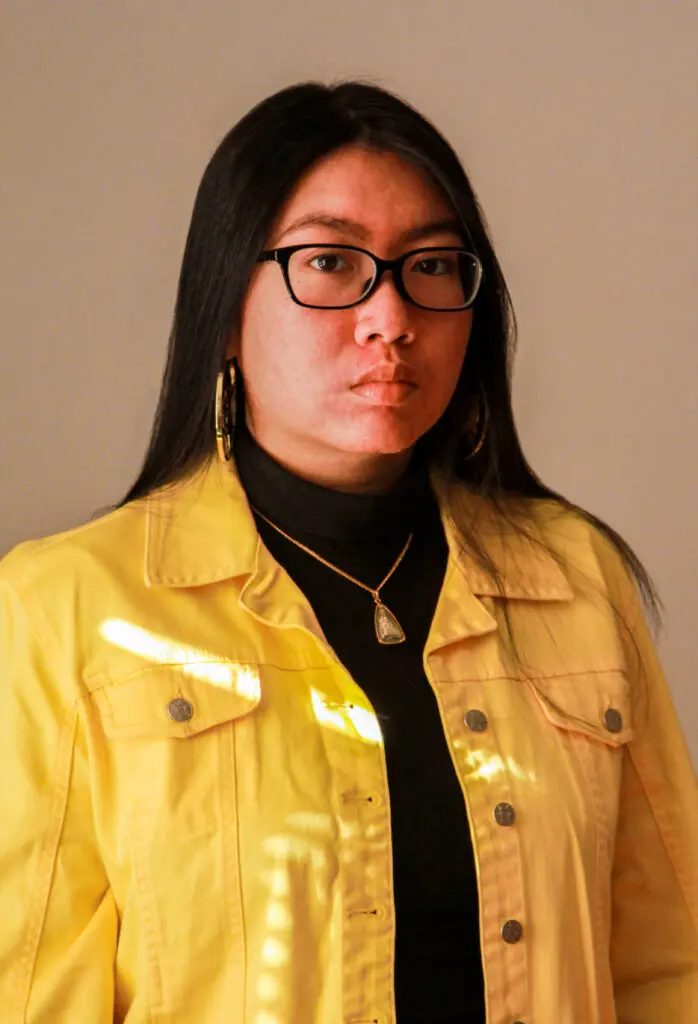 Meta4 alum Alinda "Adam" Mac is the assistant coach of the award-winning youth slam poetry team (Photo courtesy of Adam Mac)