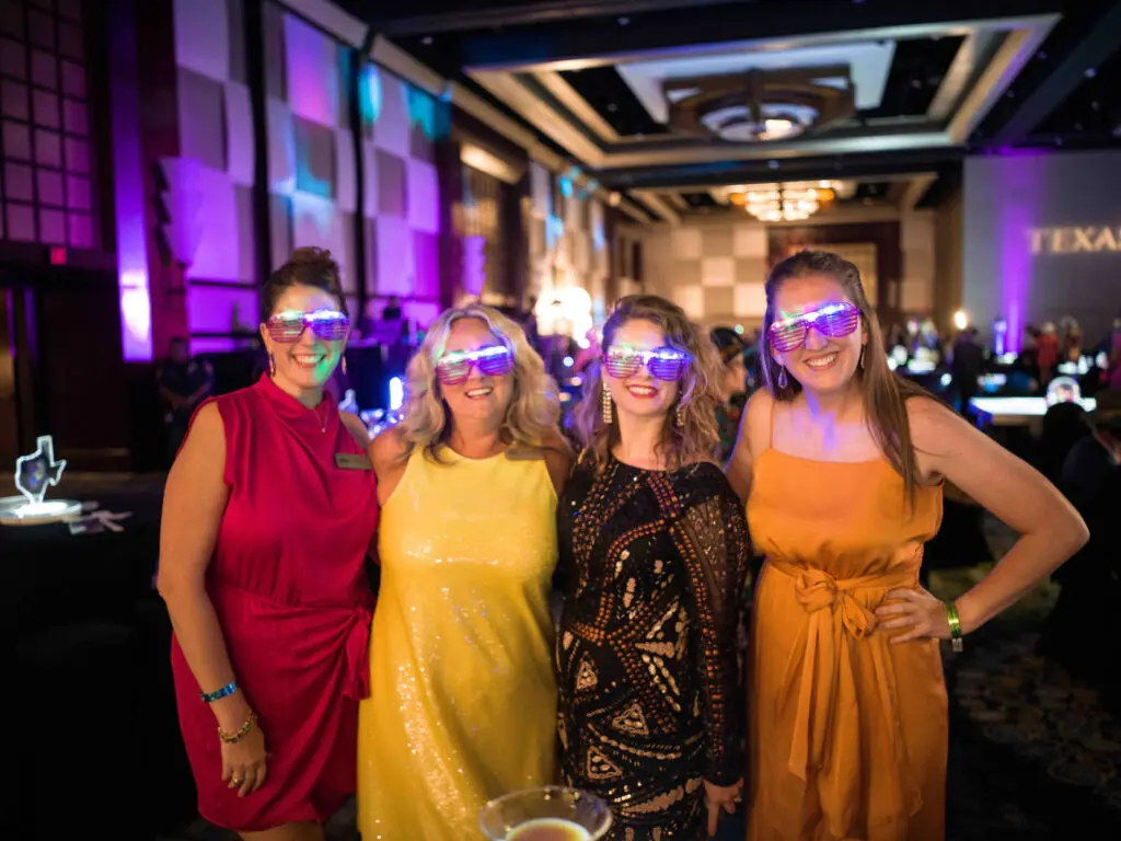 Attendees have a ball with light up glasses. (Photo by Daniel Ortiz)