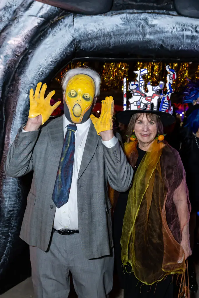 David & Susanne Theis make the sceene at the Orange Show Gala: DaliDada.(Photo by Emily Jaschke)