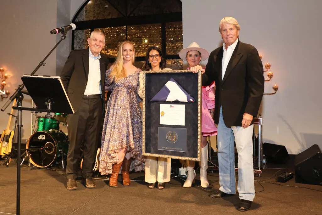 The McIngvale Family presenting the McIngvale Family Humanitarian Award to Rob Wilson with the John M. O'Quinn Foundation at Crime Stoppers record breaking gala held at The Revaire (Photo by Jacob Power)