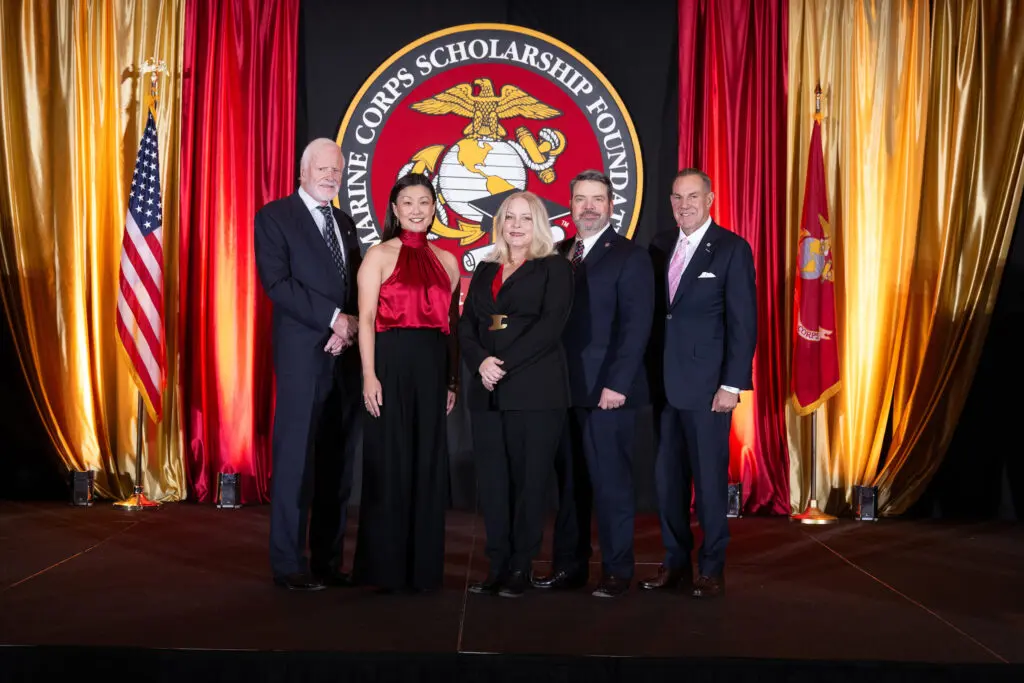 Honeree Ed de Zevallos, chairs Alison
Vasquez, Kara & John Deis, Ted Probert at the Marine Corps Scholarship Foundation Houston Awards Dinner.