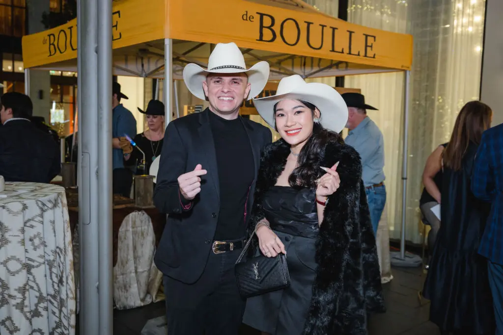Norbert Glass & Linh Glass at the de Boulle holiday party in River Oaks District (Photo by Johnny Than)