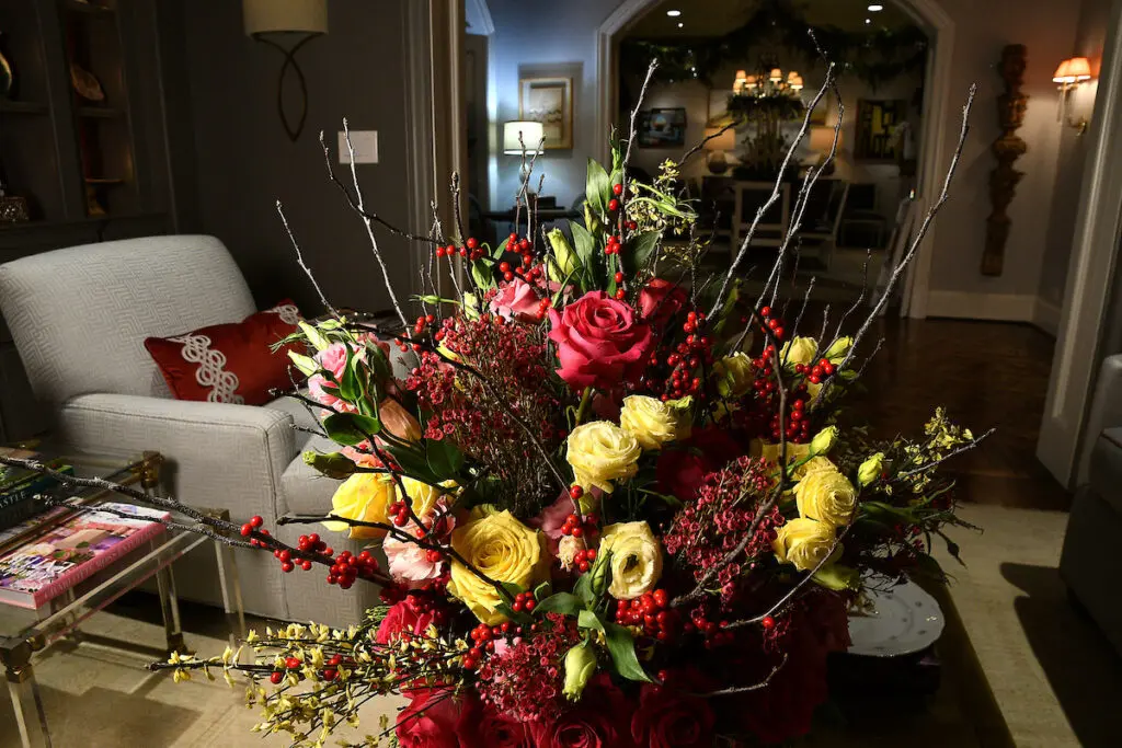 A grand arrangement by talented floral designer Jeff Bradley greets guests at the Kappa Kappa Gamma Charitable  Foundation home tour preview party.  (Photo by Dave Rossman)