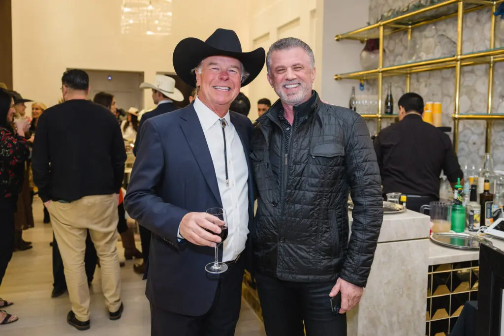 Denis Boulle, Adel Hussane at the de Boulle holiday party in River Oaks District (Photo by Johnny Than)