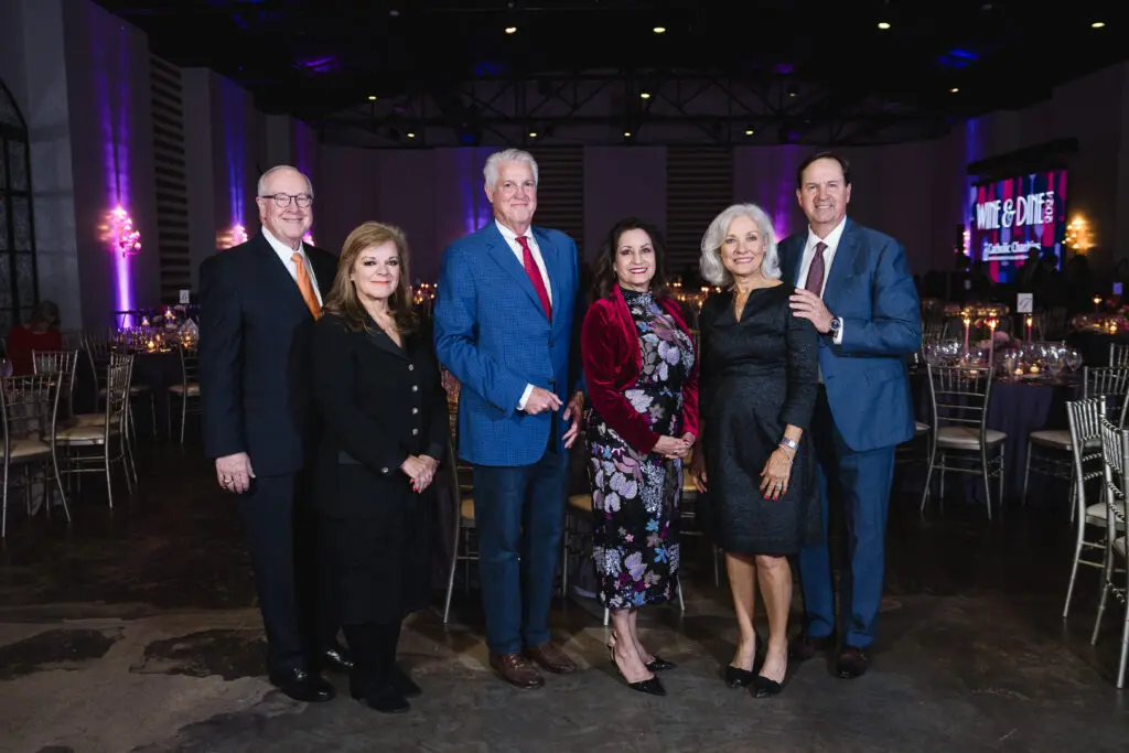 Dinner co-chairs Kerri & Downey Bridgwater, and David E. Harvey, Jr.; Catholic Charities president Cynthia Nunes Colbert; honorees Paul and Penny Layne at Catholic Charities 'Wine & Dine Dinner'