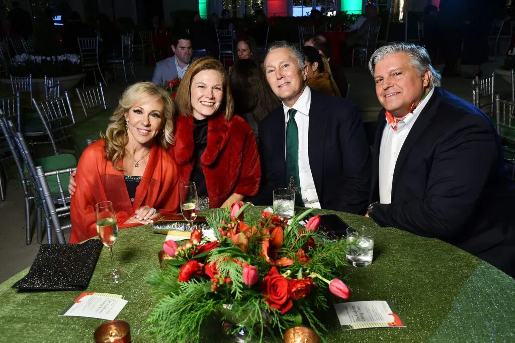 Guest, Listi Sobba, Greg Fourticq, John T. Cone at the Santa's Elves party benefiting the MD Anderson Children's Cancer Hospital