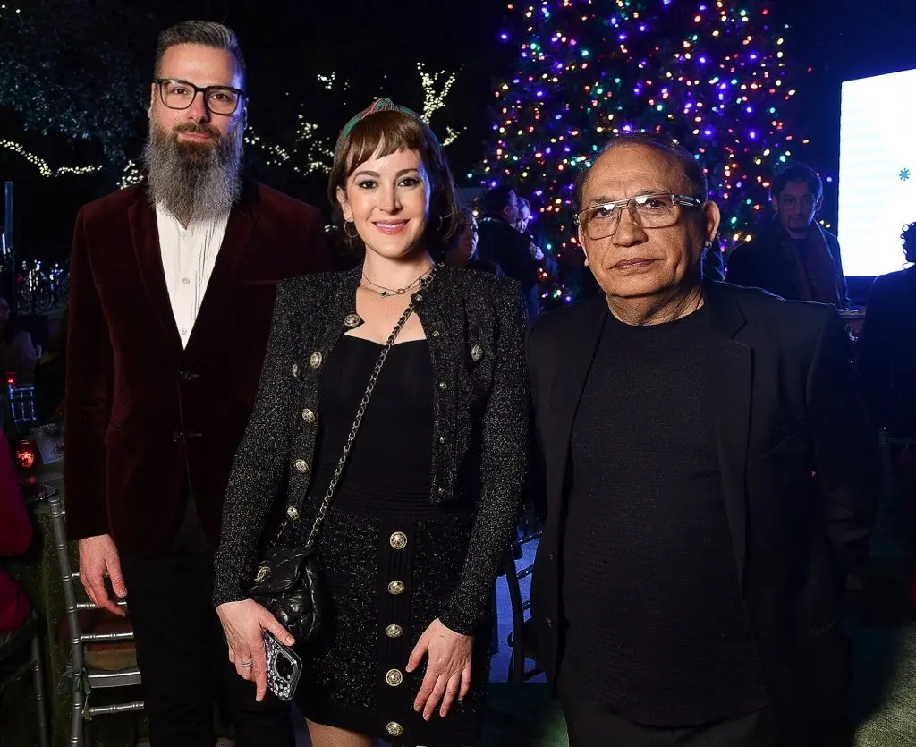 Mark Kolodny, Jenna Klein, Virinder Saini at the Santa's Elves party benefiting the MD Anderson Children's Cancer Hospital